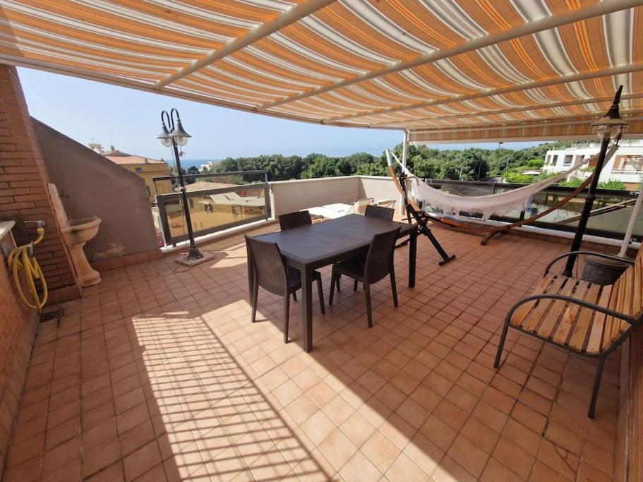 Terrazza A Nettuno E Chiesa Giubilare Santa Maria Goretti المظهر الخارجي الصورة